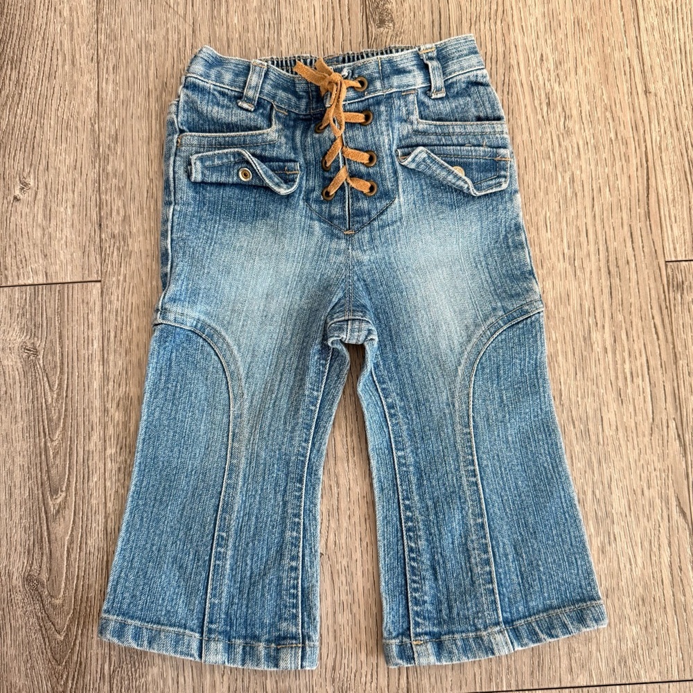Old Navy baby girl flare denim jeans with a lace-up front